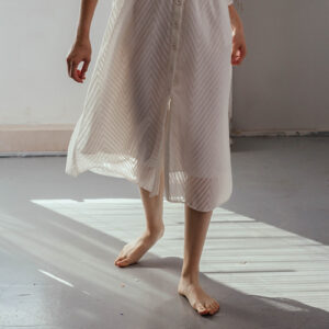 woman walking in front of window 2685150